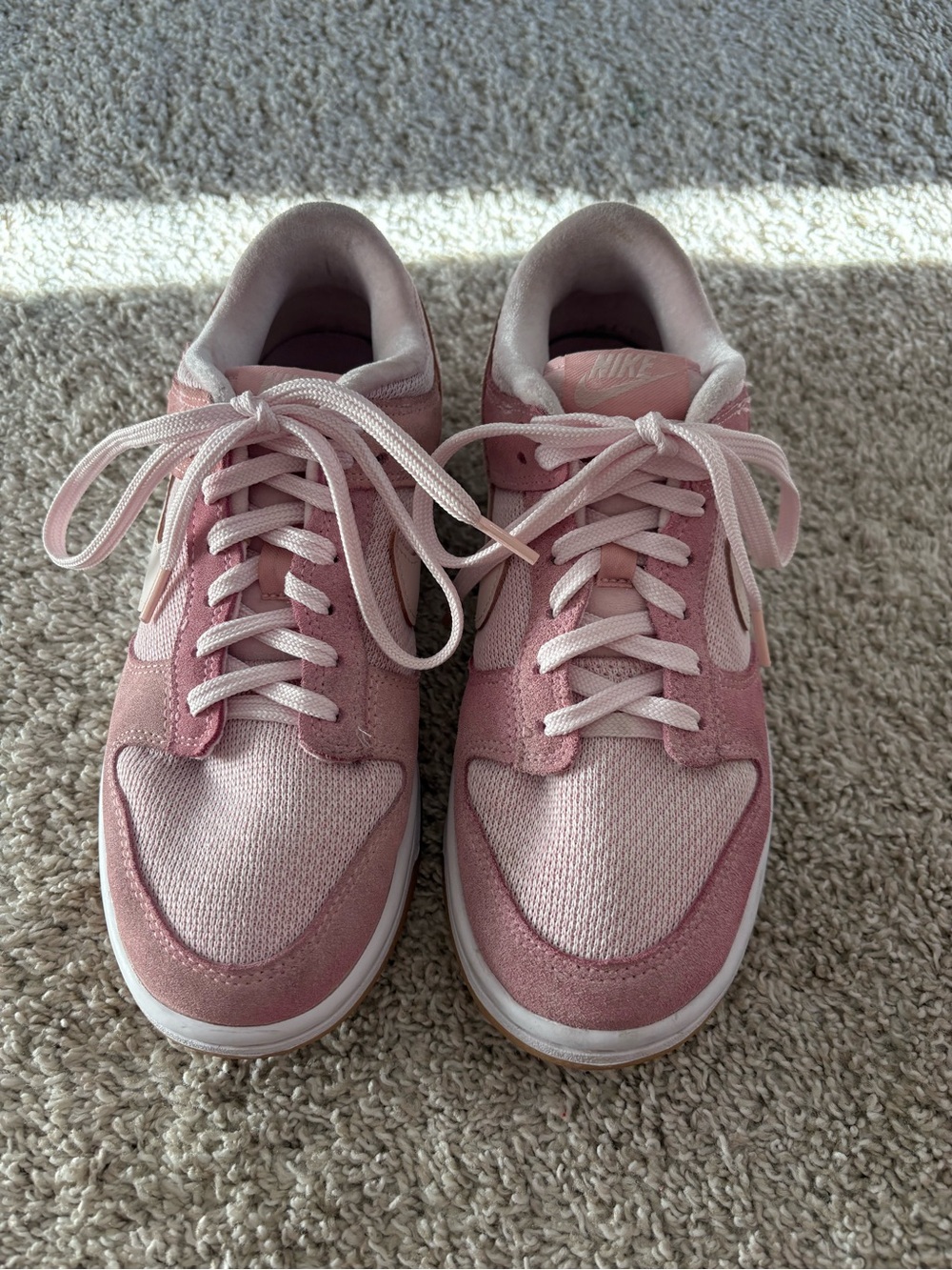 Nike Women’s Pink Suede and Mesh Low-Top Sneakers